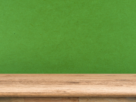 wooden countertop on green backgroundの写真素材