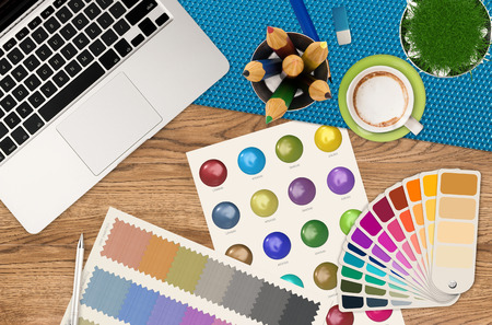 top view artist workspace on wooden backgroundの写真素材