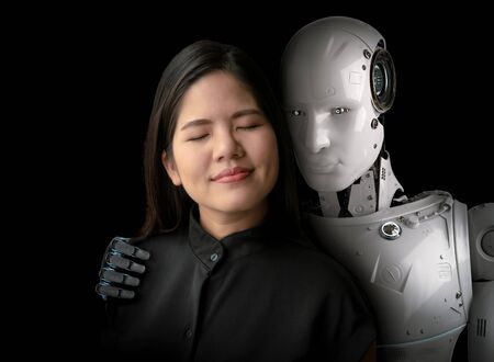 Asian woman happy living with cyborg or robotの写真素材