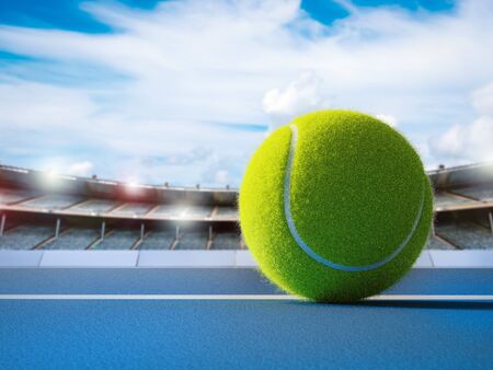 3d rendering tennis ball on blue floor with stadium backgroundの写真素材