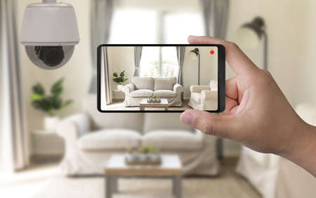 3d rendering mobile connect with home security cameraの写真素材