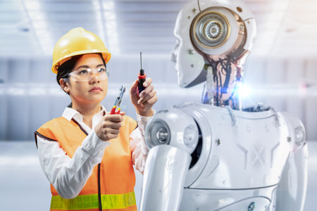 Asian engineer work with 3d rendering cyborg in factoryの写真素材