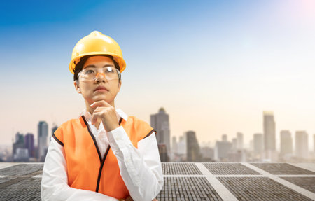 Construction business concept with civil engineer and cityscape backgroundの写真素材