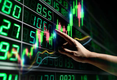 Stock analysis with growth graph and on digital tablet