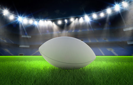 3d rendering rugby ball on field in stadiumの写真素材