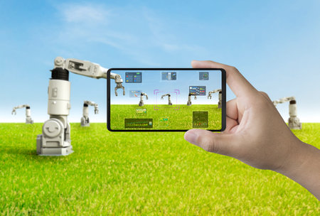 Agriculture technology concept with 3d rendering robot assistant in smart farm connect to mobile phoneの写真素材
