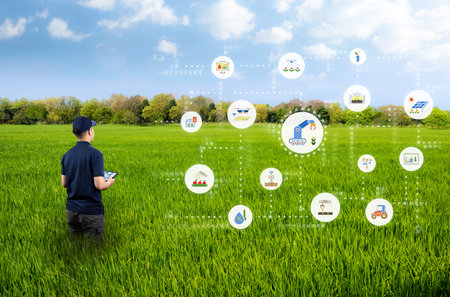 Agriculture technology concept with agricultural engineer or farmer work with tablet in farm