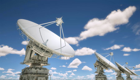 3d rendering group of satellite dishes for digital telecommunication with cloudy blue sky backgroundの写真素材