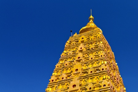 Golden pagoda in Buddhist Temple, Sangklaburi, Thailandの写真素材