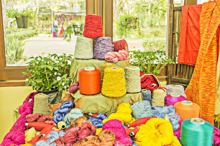 spools of thread of different size, texture and colour