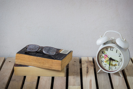 clock  Vase Glasses on a book
