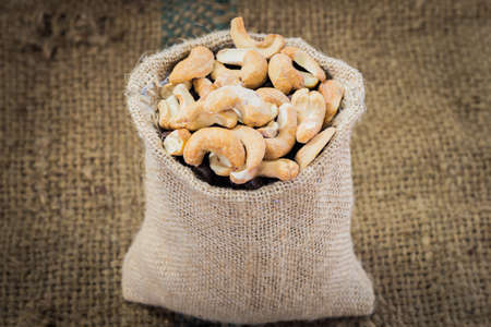 cashew nuts on sackの写真素材