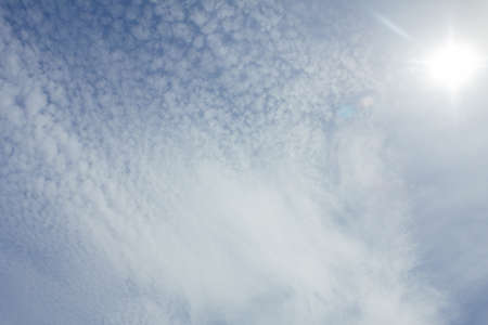 Fantastic soft white clouds against blue sky