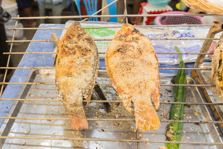 Grilled fish for sale in countryside.の写真素材