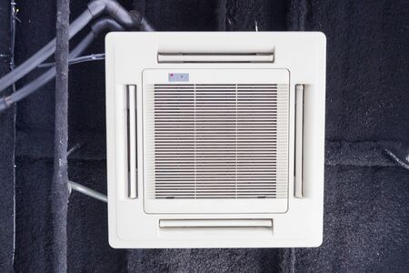 air conditioning fixed to a wall background.の写真素材