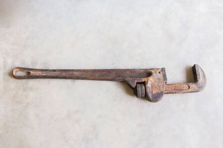 Pipe wrench Heavily used pipe wrench in construction site