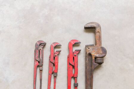 Pipe wrench Heavily used pipe wrench in construction site