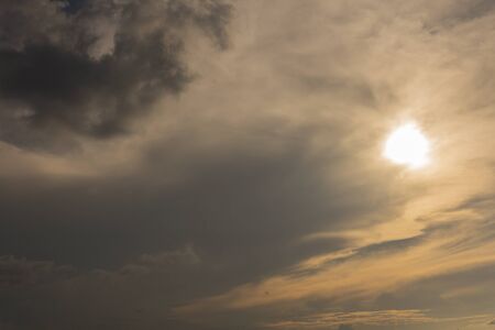 Soft white clouds against blue sky background.