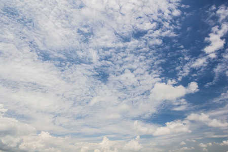 Clouds against blue sky background.