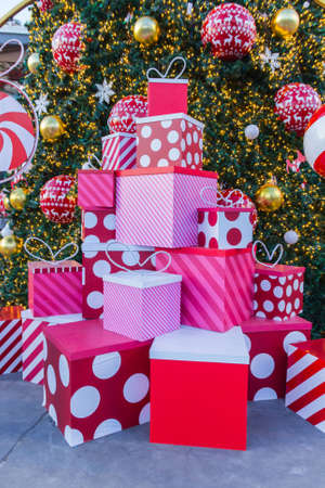 Decorated Christmas tree on sparkling light backgroundの写真素材