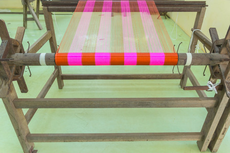 Detail of weaving loom for homemade silk or textile production