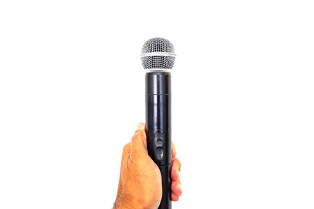 Microphone in hand on white background.