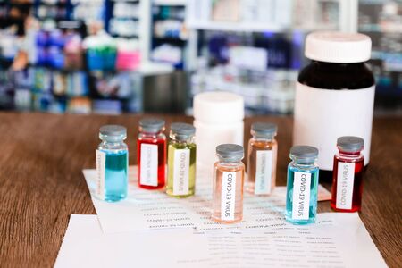 Syringe and illustrative of virus in background Medical Concept of composite photo of Corona Virus Outbreak Corona virus 2020 disease,COVID-19,nCoVの写真素材