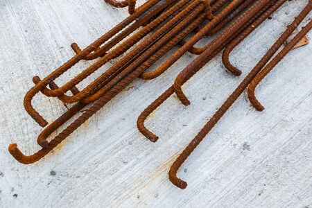 Hook deformed steels with rusty surface in construction area. Preparing deformed bar for reinforced...