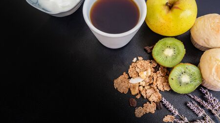 Black coffee and bakery in black background. Healthy breakfast in beautiful set up with lavender fruits. coffee lover, の写真素材