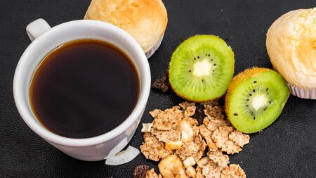 Black coffee and bakery in black background. Healthy breakfast in beautiful set up with lavender fruits. coffee lover,の写真素材