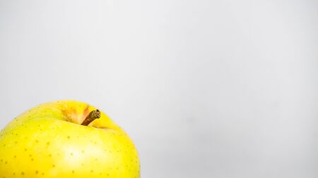 Isolate yellow apple fruit in white background. fruit backgroundの写真素材