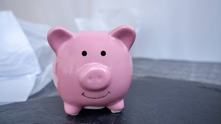piggy bank in white background, saving money for investment concept. copy spaceの写真素材