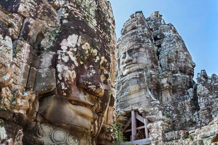Bayon stone faces in Bayon temple at Angkor, Siem Reap, Cambodia.の写真素材