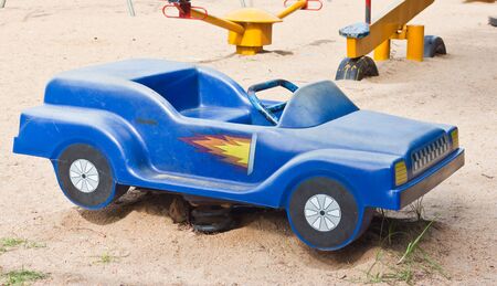 blue car toy in playgroundの写真素材