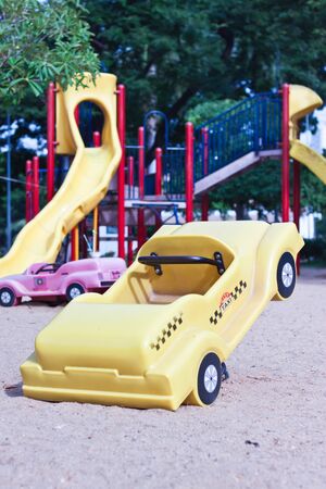 yellow car toy in playgroundの写真素材