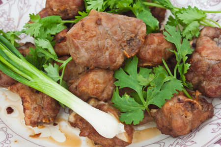 fry pork include leek and parsleyの写真素材