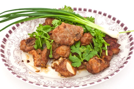 fry pork include leek and parsleyの写真素材