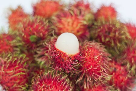 Many appetizing rambutans from fram of Thailandの写真素材