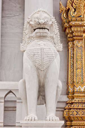 The lion image in front of Buddhist church at wat benchamaborphit in Thailandの写真素材