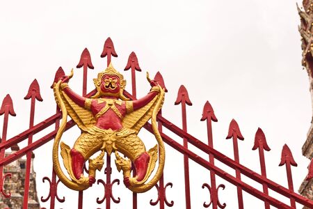 Garuda on fence at Wat-Arun in Thailandの写真素材