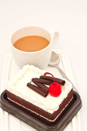 Blueberry chocolate cake on white paperの写真素材