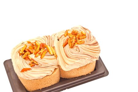 Almond cake on white paperの写真素材