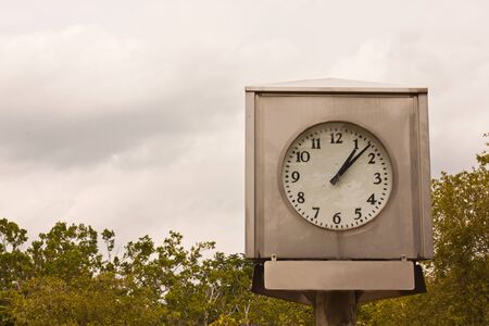 Clock in gardenの写真素材
