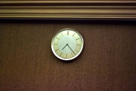 clock on the wallの写真素材