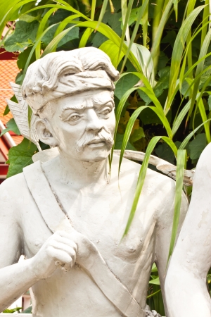 the man statue with black backgroundの写真素材