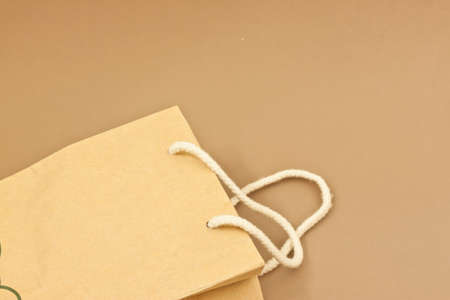 paper bag with brown backgroundの写真素材