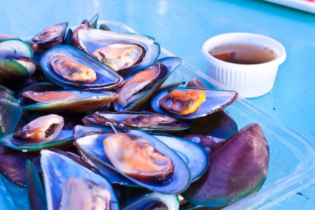 Steamed clams with a delicious sauceの写真素材