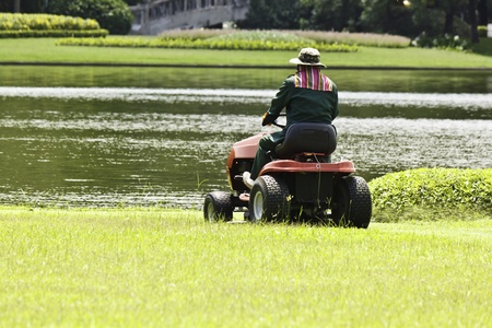 The gardener was mowing