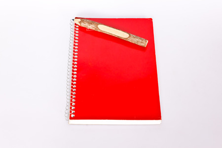 notebook and pencil on paperの写真素材