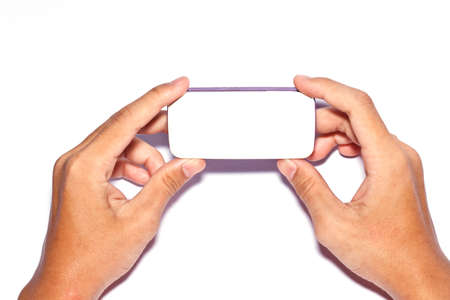 the hand with mobile phoneの写真素材